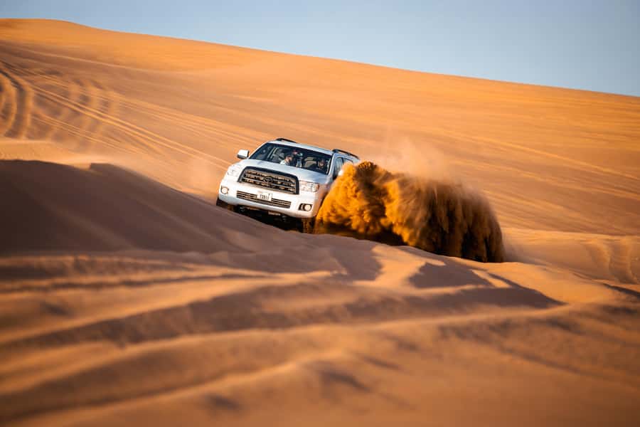Dubai: Premium Red Dune Safari with Sandboarding & BBQ - Sandboarding and the photo stop
