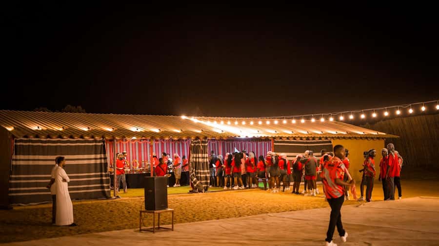 Dubai: Premium Red Dune Safari with Sandboarding & BBQ - BBQ dinner and evening performances