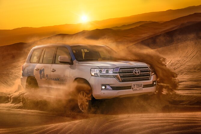 Dubai Premium Red Dunes Safari, Camels & 5<em> BBQ at Al Khayma camp – Key points at a glance’ /></p>
<ul>
<li><strong>Red dunes at Lahbab:</strong> Expect taller, more colorful dunes and a 30 to 45-minute 4WD dune-bashing session.</li>
<li><strong>Small shared group:</strong> The vehicle carries a maximum of six people, but this is still a shared tour, not a private safari.</li>
<li><strong>Many included extras:</strong> Camel rides, sandboarding, Arabic coffee, dates, sweets, henna, falcon photos, drinks, dinner, shows, and stargazing are included.</li>
<li><strong>Optional ATV ride:</strong> Quad bikes are available at an additional cost and carry separate safety and insurance responsibilities.</li>
<li><strong>Al Khayma Camp dinner:</strong> The evening includes a 5-star open buffet with vegetarian and non-vegetarian BBQ choices.</li>
<li><strong>Timing matters:</strong> Evening departures include the fire show and stargazing. The 11:30 AM option includes lunch instead, with no night-time activities.</li>
</ul>
<h2>Why the Lahbab red dunes are worth the drive</h2>
<p><img width="669" height="446" decoding="async" src=