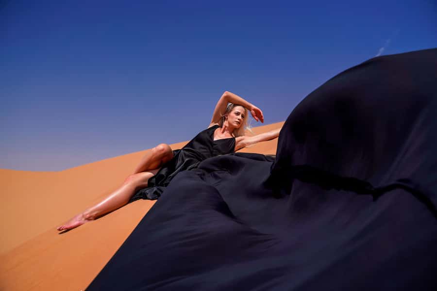 Dubai: Private Flying Dress Photography and Dune Drive Trip - Choosing the flying dress from the catalog