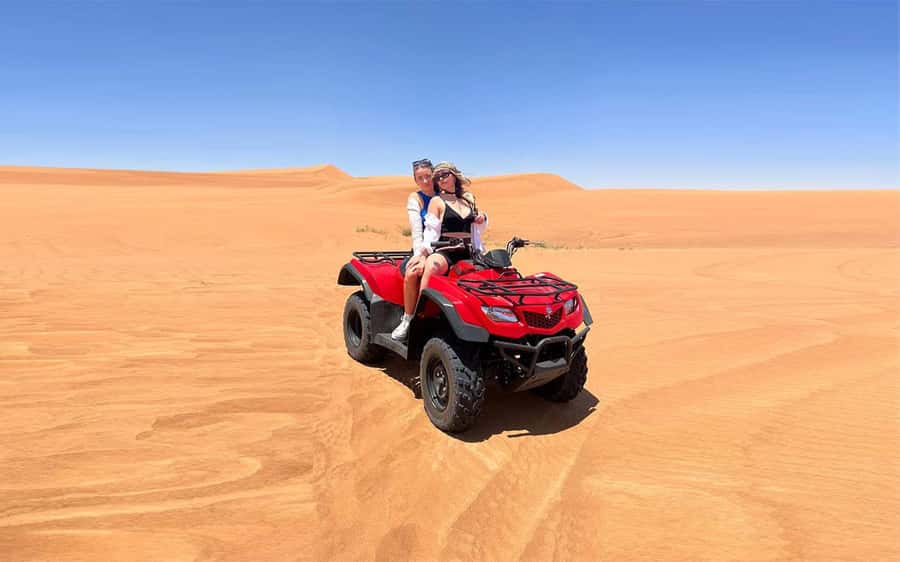 Dubai: Quad Bike, Dune Buggy, and Sandboarding Experience - One hour of riding through the desert