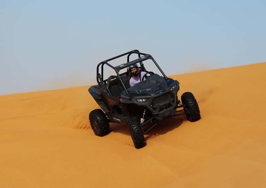 Dubai: Quad Bike, Dune Buggy, and Sandboarding Experience - Sandboarding on the red dunes