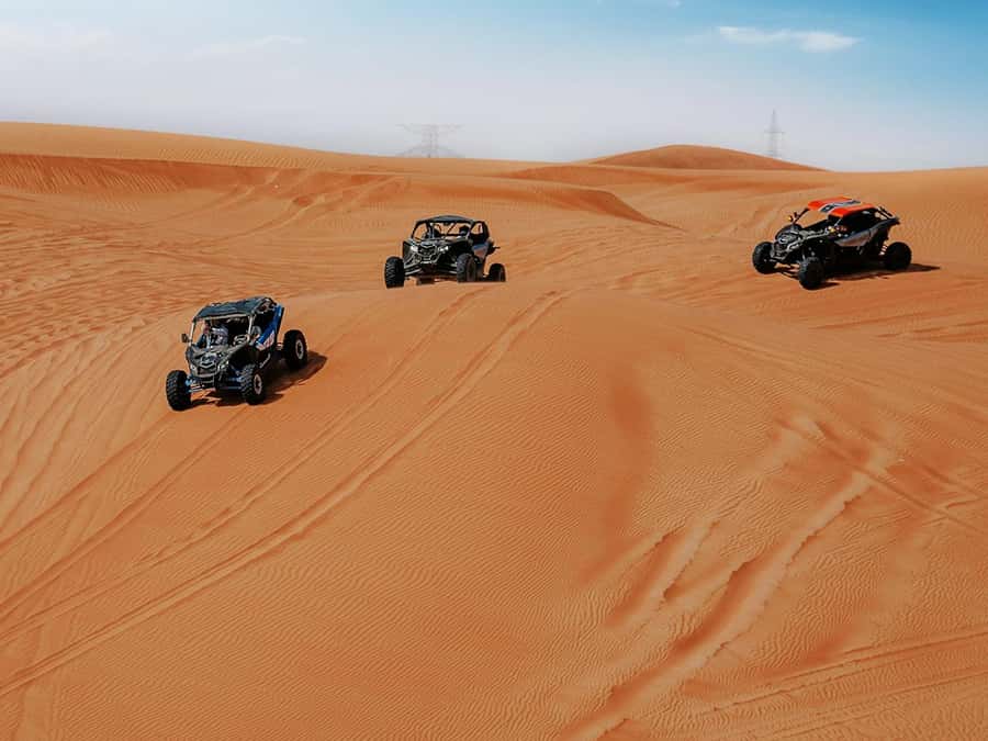 Dubai: Quad Bike or Dune Buggy Adventure & Optional Transfer - Who will enjoy this most?