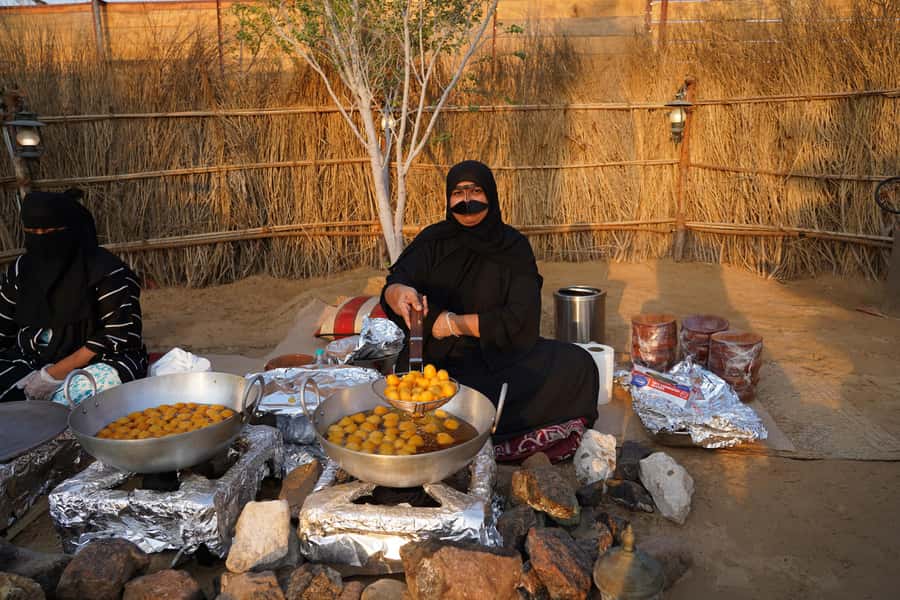 Dubai: Quad Bike Safari, Camels & Al Khayma Camp BBQ Dinner - Sandboarding, photos, and a short camel ride