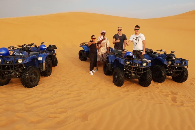 Dubai: Quad Bike Safari, Camels, & Camp with BBQ Dinner - From Dubai hotels to Lahbab’s red dunes