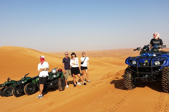 Dubai: Quad Bike Safari, Camels, & Camp with BBQ Dinner - Sandboarding, photos, and a five-minute camel ride