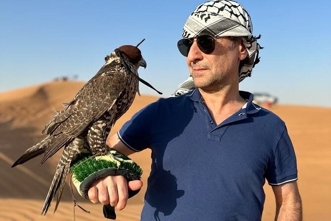Dubai Red Desert Safari sharing basis with Camel, Shows & Dinner - Sandboarding and Sunset in the Desert