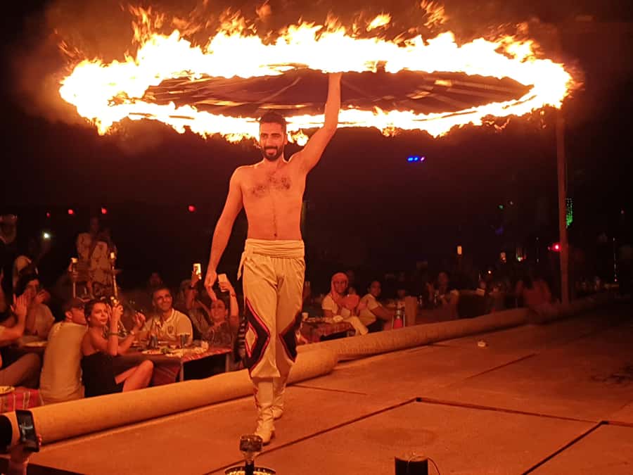 Dubai: Red Dune Desert, Dune Buggy Ride & BBQ Buffet Dinner - Sandboarding, camels, and sunset photographs