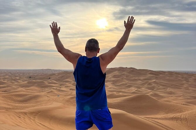 Dubai Red Dune Safari with Bedouin BBQ Dinner & Hotel Transfers - Camel ride, falcon show, and henna at Al Awir
