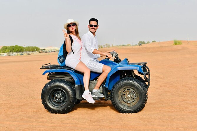 Dubai: Red Dunes Desert Safari, Camel ride, Sandboard, Quad Bike - Sandboarding on soft red sand