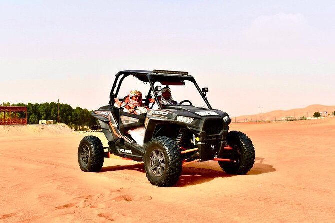 Dubai: Red Dunes Desert Safari, Camel ride, Sandboard, Quad Bike - Camel riding, dates, and Arabic coffee