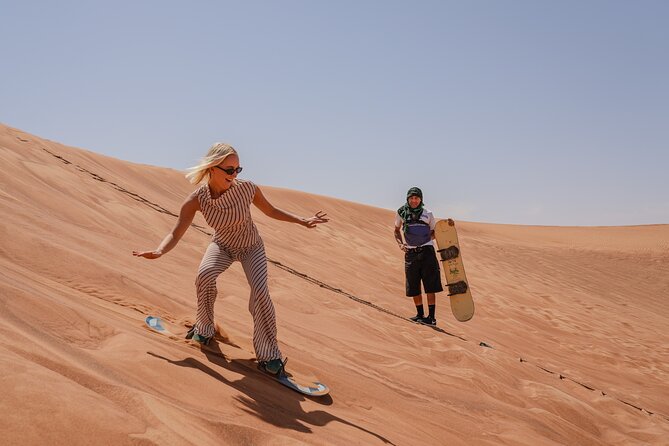 Dubai Red Dunes Desert Safari, Quad Bike, Camels at Al Khayma - Sandboarding, photographs, and the camel stop