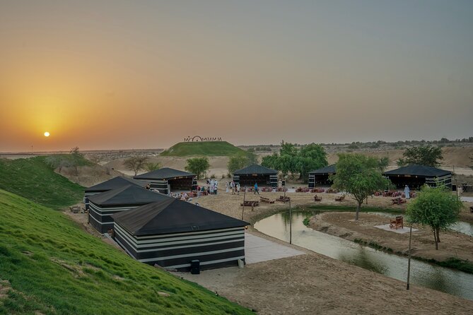Dubai Red Dunes Desert Safari, Quad Bike, Camels at Al Khayma - Pickup, the 45-minute ride, and the staging stop