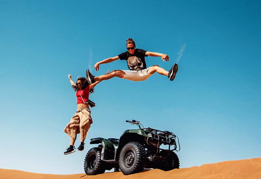 Dubai: Red Dunes Quad Bike with Sandboarding, Camels and BBQ - One hour on the quad bikes