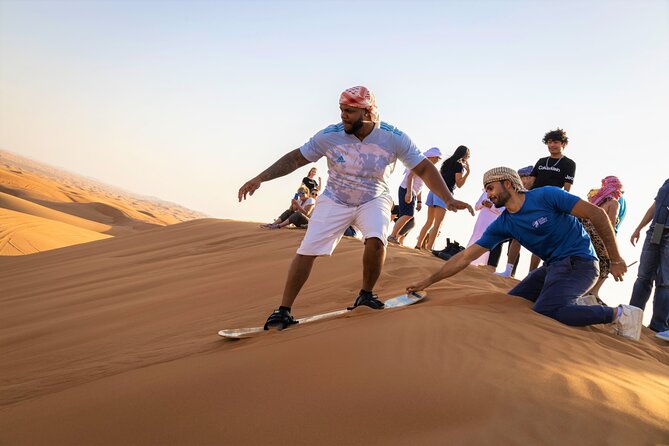Dubai Red Dunes with Sandboarding, Camel Ride, Falcon & VIP Camp - Dune bashing is the adrenaline centerpiece