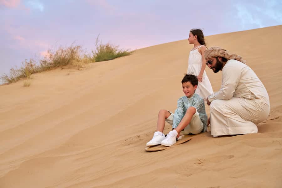 Dubai’s Best Desert Safari: Live Show & Gourmet BBQ Dinner - Camel feeding, falcons, and a short traditional ride
