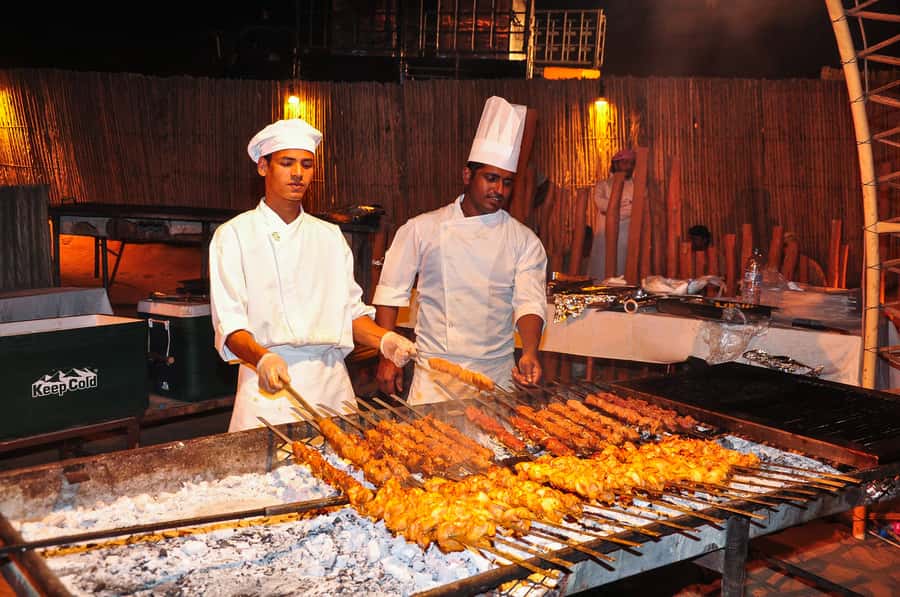 Dubai: Safari, Quad Bike, Camel Ride, and Buffet Dinner - From Dubai towers to Lahbab’s red dunes