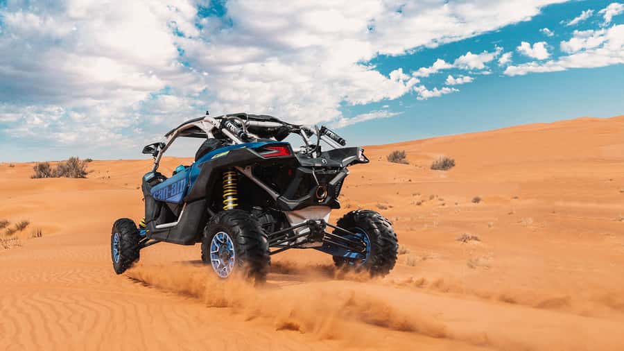 Dubai: Self-Drive 4WD Dune Buggy Guided Desert Adventure - Riding toward Big Red and Pink Rock