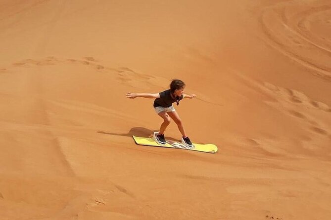 Dubai Self-drive Quad Bike, Sand Boarding, Camels & Refreshments - A short camel ride and a Bedouin-style camp