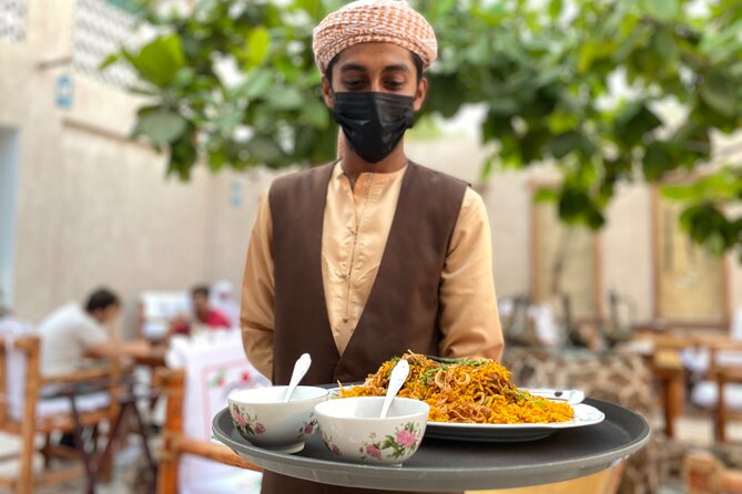 Dubai Souks, Food & Culture Walking Tour - Starting with tea and a nostalgic Deira snack