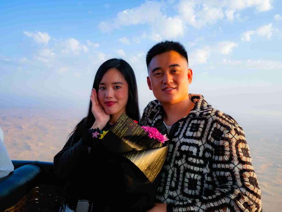 Dubai: Sunrise Hot Air Balloon Flight, Breakfast, Camel Ride - Leaving Dubai before dawn in a shared 4x4