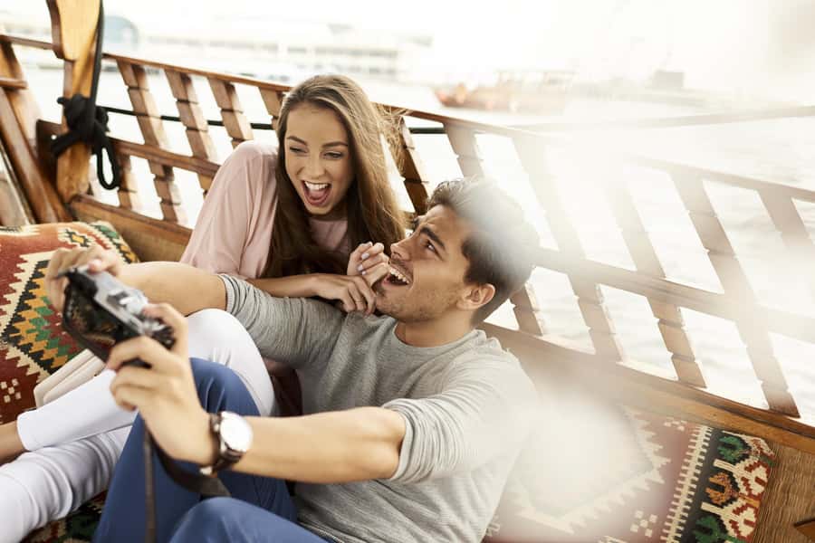 Dubai: Sunset Cruise on Traditional Boat & Emirati High Tea - Watching the canal change at sunset