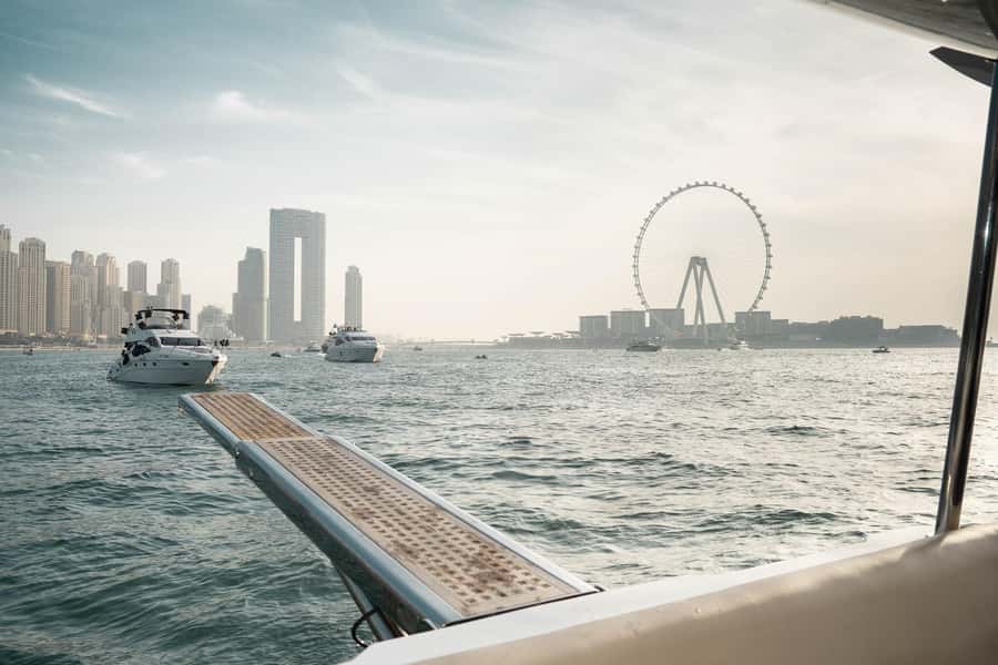 Dubai: Sunset & Night Cruise with Bites and Drinks - Dubai Marina from the water