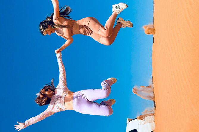 Dubai Sunset Red Dune Desert Safari, Sandboarding and Camel Ride - Sandboarding adds a simple, satisfying challenge