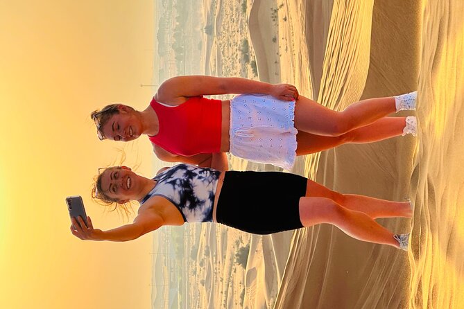 Dubai Sunset Red Dune Desert Safari, Sandboarding and Camel Ride - Dinner, shows, and quad biking need careful checking