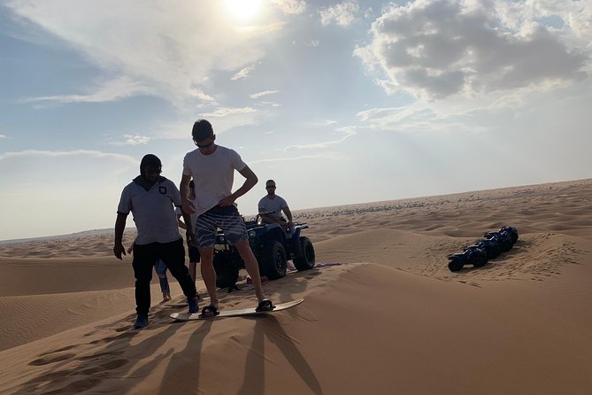 Dubai: Unique SUNSET Quad Bike Red Dunes Safari - Sunset from the highest dunes