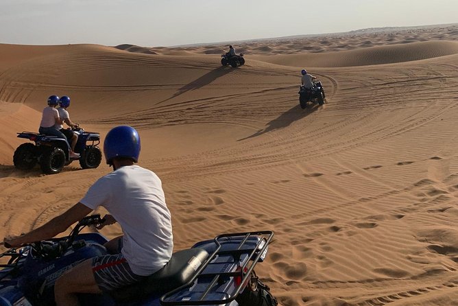 Dubai: Unique SUNSET Quad Bike Red Dunes Safari - What dinner at the desert camp includes