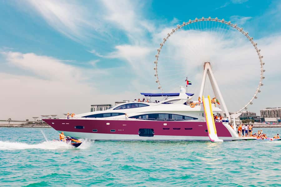 Dubai: Yacht Cruise with Swimming, Snorkeling and BBQ Lunch - The JBR swim stop and water toys