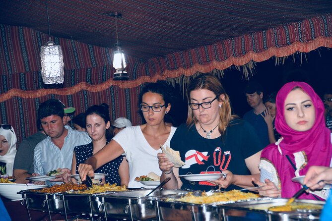 Evening Desert Safari Abu Dhabi with Hot BBQ Dinner - Camel farm, camel ride, and desert customs