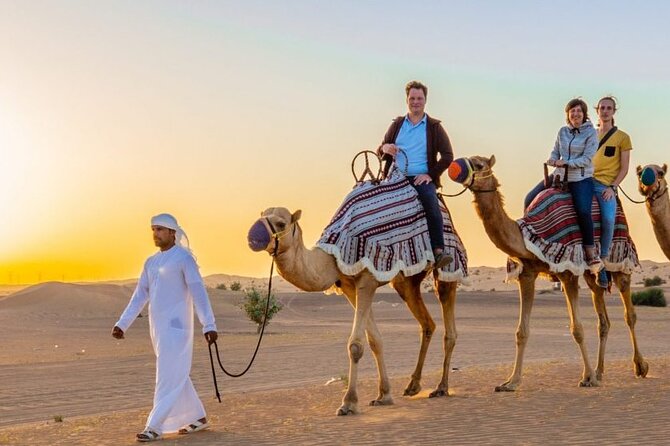 Evening Desert Safari Dubai with Camel Riding & BBQ Buffet Dinner - Belly dancing, fire, tanura, and Arabic dance
