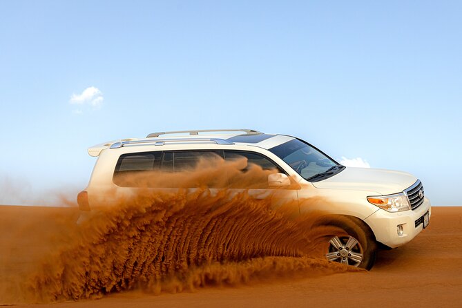 Evening Desert Safari in Dubai, Sandboard & BBQ Dinner - Sandboarding, with realistic expectations