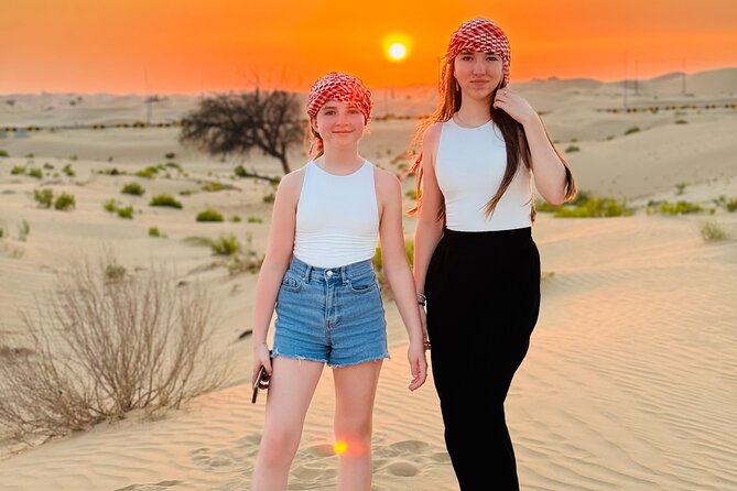 Evening Desert Safari Quad Bike and Live BBQ - Camel riding, sandboarding, and sunset time