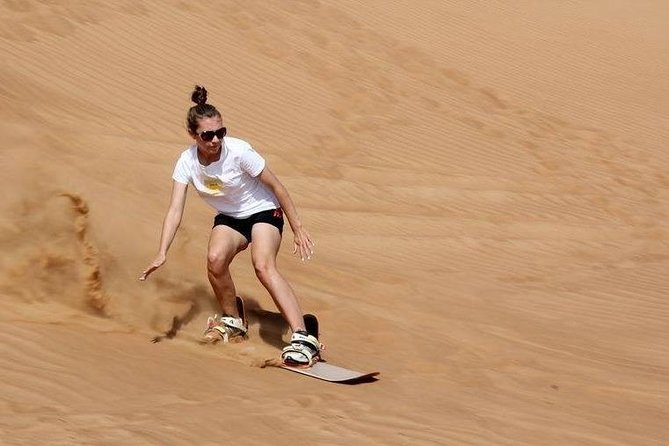 Evening Desert Safari with BBQ Dinner - From Dubai’s streets to Sharjah’s red dunes
