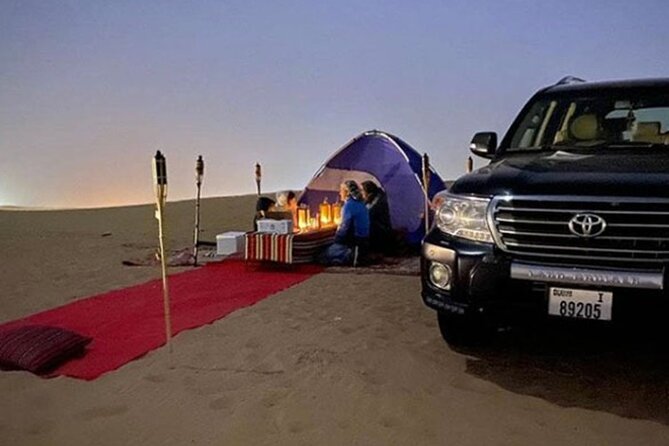 Evening desert safari with camel ride and BBQ dinner - Sunset photos, sandboarding, and traditional dress