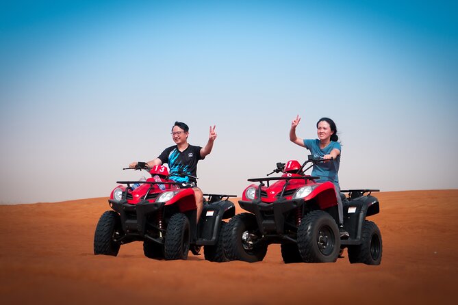 Evening Quad Bike, Desert Safari in Dubai , BBQ Dinner and Shows - Dune bashing across the high red dunes