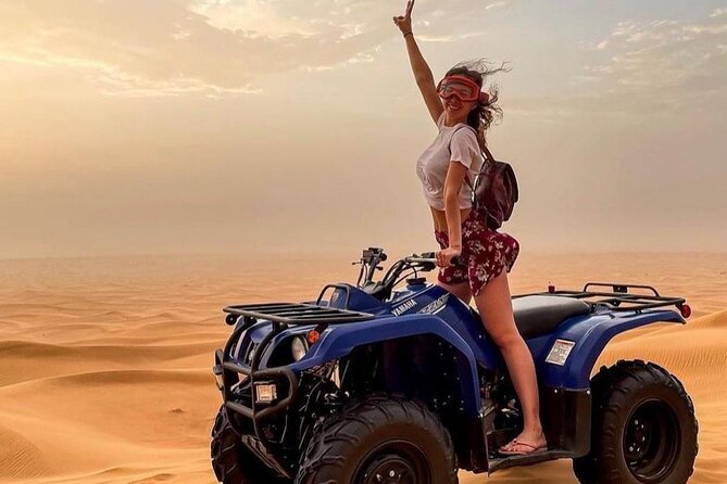 Evening Red Dunes Safari with Quad Biking, BBQ Dinner & LiveShows - Camel riding gives you a short taste of desert tradition