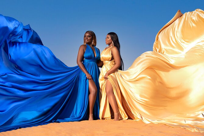 Flying dress photoshoot activity in Dubai - A red desert photo session built around the dress