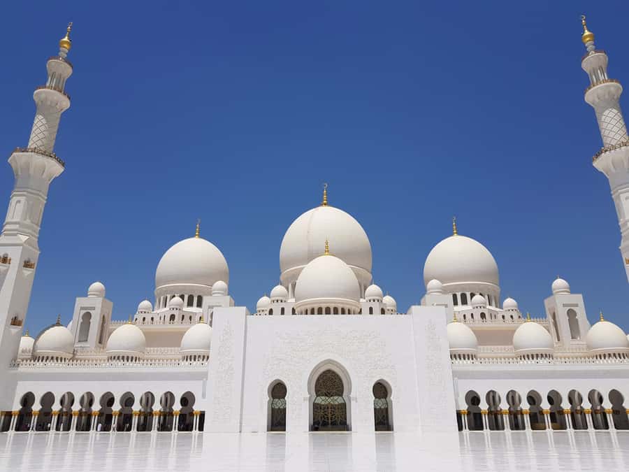 From Dubai: Abu Dhabi City Tour - Entering Sheikh Zayed Grand Mosque