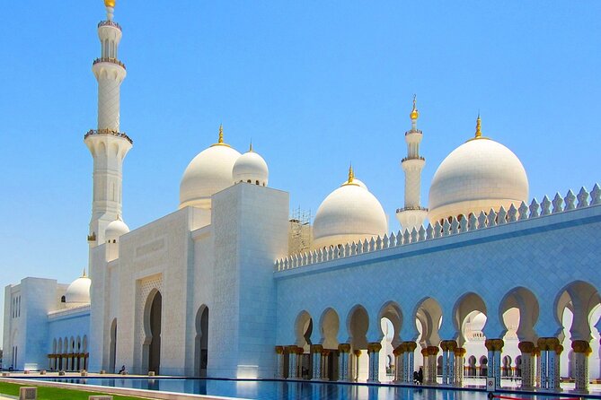 From Dubai: Abu Dhabi Premium Full-Day Sightseeing Tour & Louvre - Louvre Abu Dhabi beneath the great dome