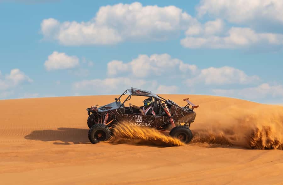 From Dubai: Zerzura Dune Buggy Experience & Fossil Discovery - Sandboarding near Camel Rock