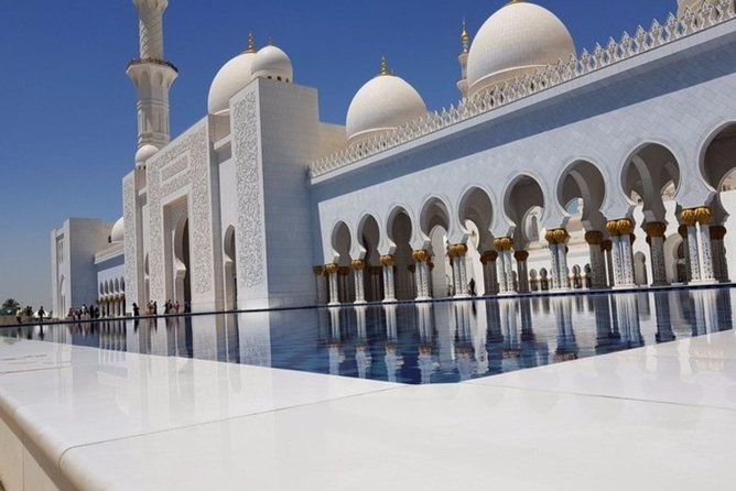 Full-Day Abu Dhabi City Tour from Dubai Including Lunch - Transport, group size, and the nine-hour rhythm
