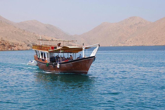 Full-Day Mussandam Cruise with Lunch Dibba - Boarding the wooden dhow
