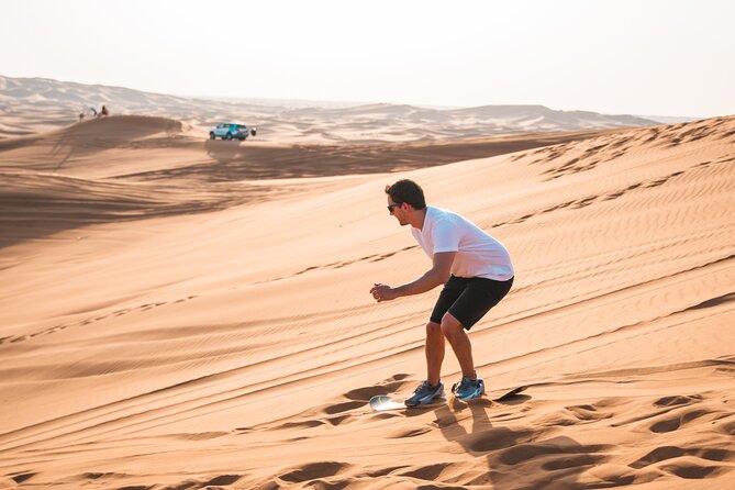 Full Day Safari Grand Adventures with Dune Bash on 4X4 in Dubai - Sandboarding and the desert photo break