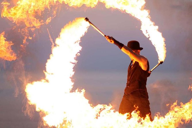 Half-Day Dubai Desert Safari With 7 Live Shows and BBQ Dinner - From Dubai streets to open red dunes