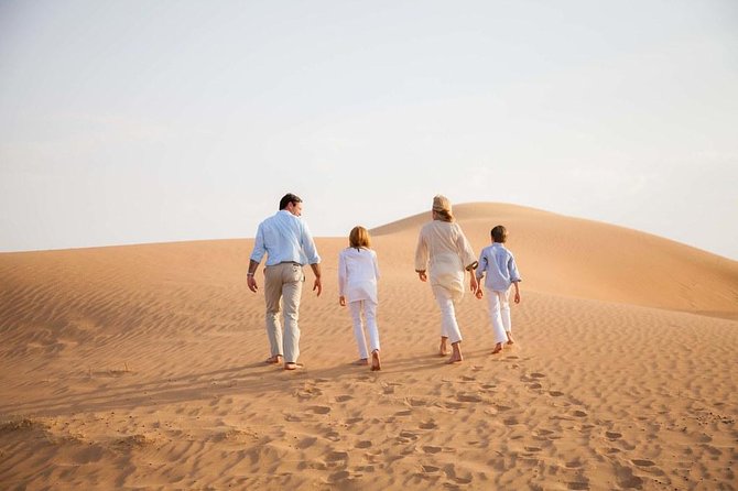 Half-Day Dubai Desert Safari With 7 Live Shows and BBQ Dinner - Sandboarding adds a simple desert challenge