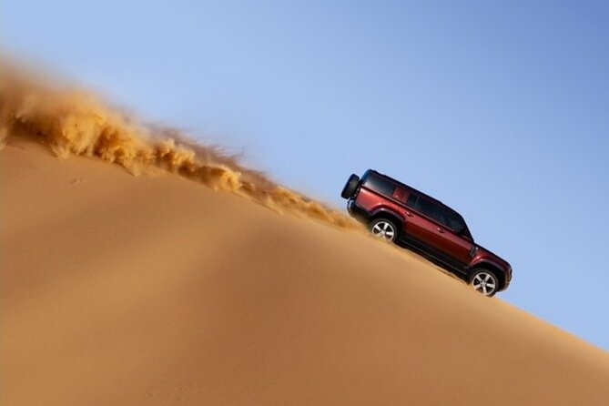 High Red Dunes Thrilling Desert Safari Sand Boarding BBQ Dinner - Sandboarding gives you a second way to use the dunes